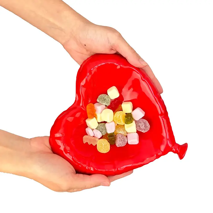 Kleiner Taschenentleerungsteller in Form eines herzförmigen Ballons